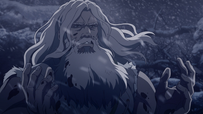 Helm Hammerhand stands in the snow with bloody hands in The Lord of the Rings: The War of the Rohirrim