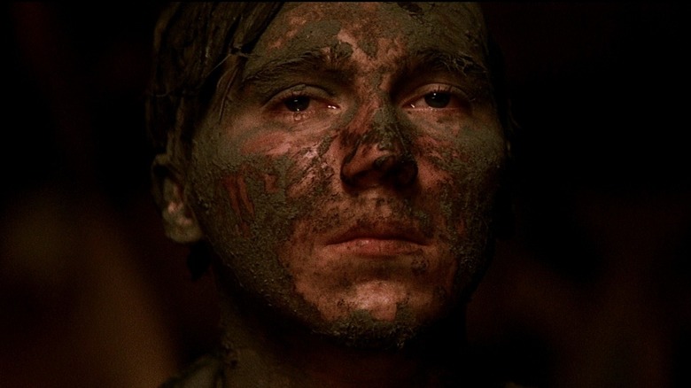 Paul Dano covered in dirt