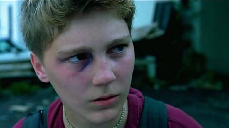 Paul Dano looking off to the side