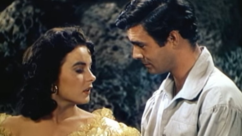 Pirate captain talking to a man