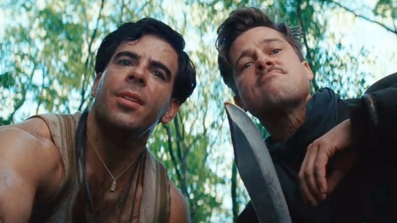 The Bear Jew (Eli Roth) and Aldo Raine crouching down in "Inglourious Basterds."