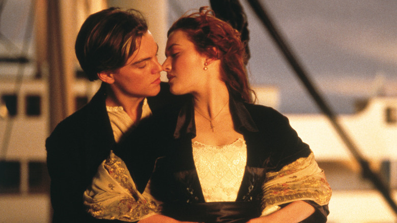 Jack holding his arms around Rose