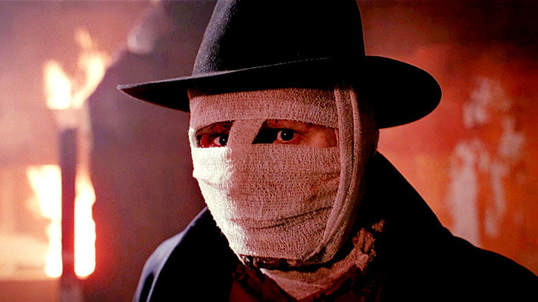 Darkman (Liam Neeson) wearing bandages in 
