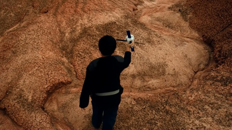 Diné boy with satelite toy