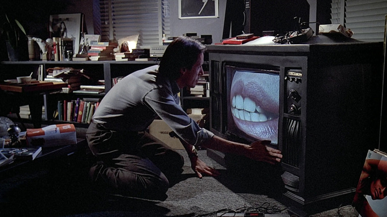 James Woods watches TV