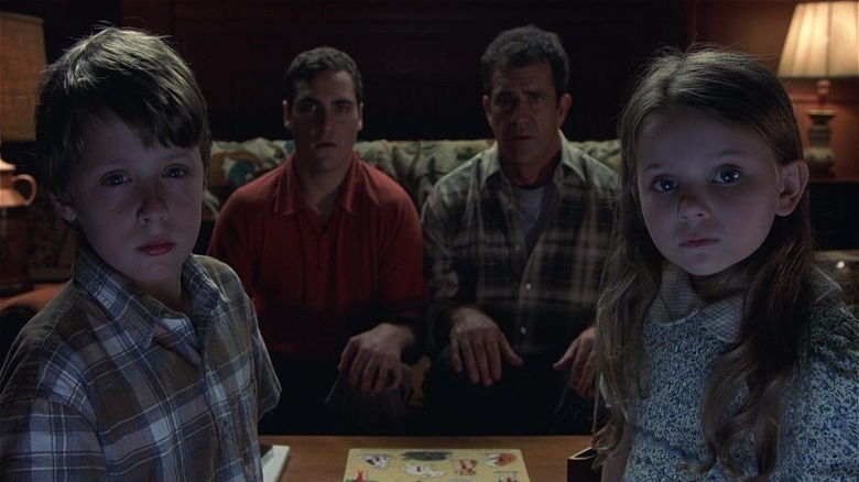 Family in Signs look scared