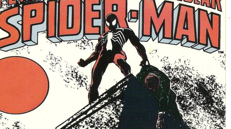 Spider-Man standing on rooftop