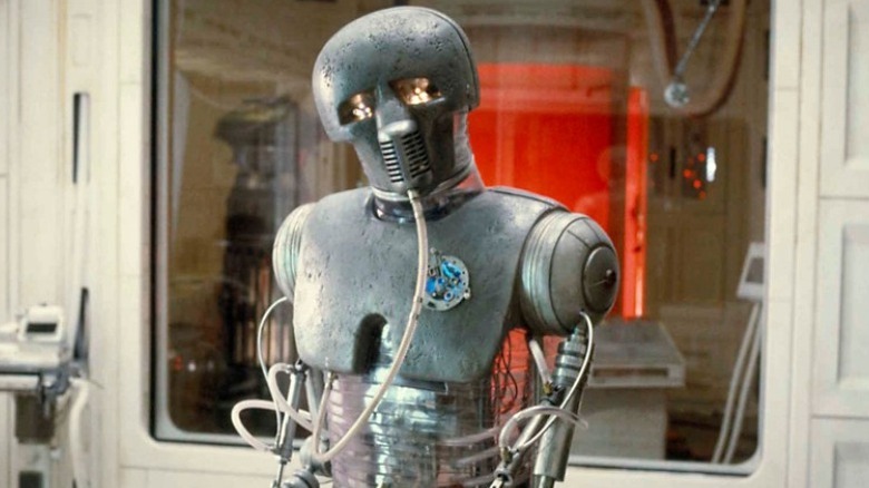 2-1B monitors Luke Skywalker
