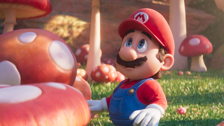 Mario glances above the mushrooms