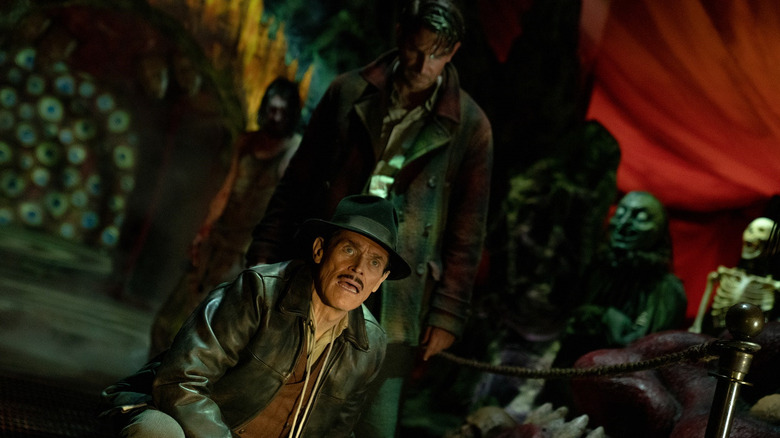 Bradley Cooper and Willem Dafoe in "Nightmare Alley"