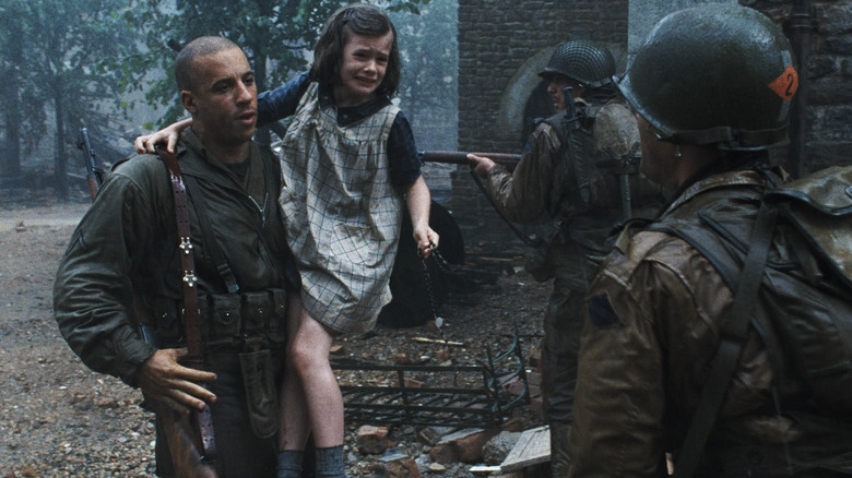 Vin Diesel rescues a girl in Saving Private Ryan