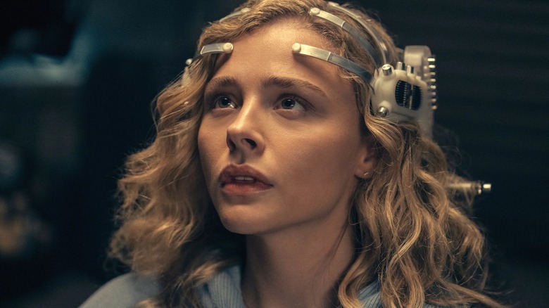 Chloë Grace Moretz's Flynne puts on a futuristic VR headset in The Peripheral