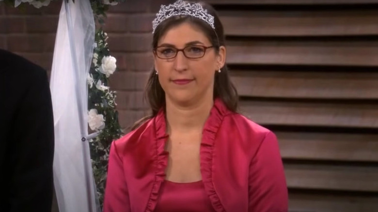 Amy wearing a tiara and a pink dress on The Big Bang Theory