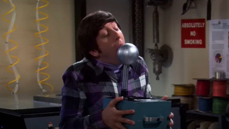 Howard kissing a machine on the theory of the big explosion