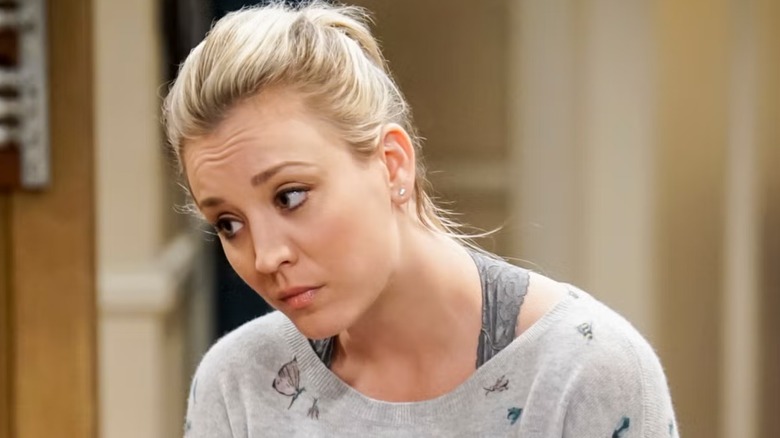 Penny looking down and concerned on The Big Bang Theory