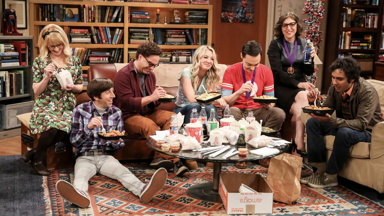 Bernadette, Howard, Leonard, Penny, Sheldon, Amy, and Raj eating Chinese food together in The Big Bang Theory