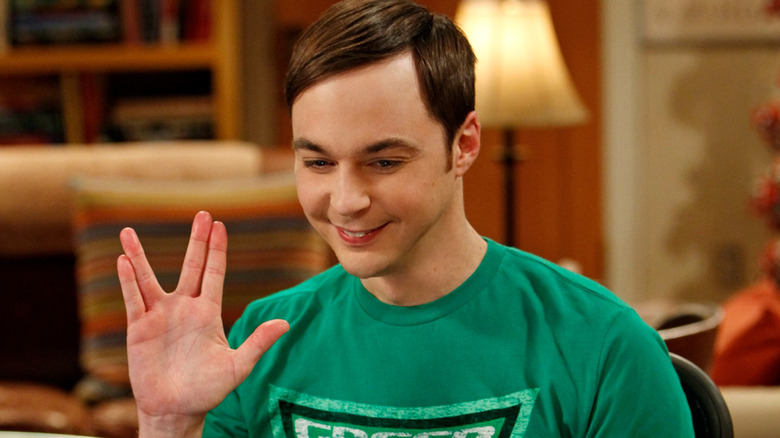 Sheldon doing the Klingon Salute and smiling on The Big Bang Theory