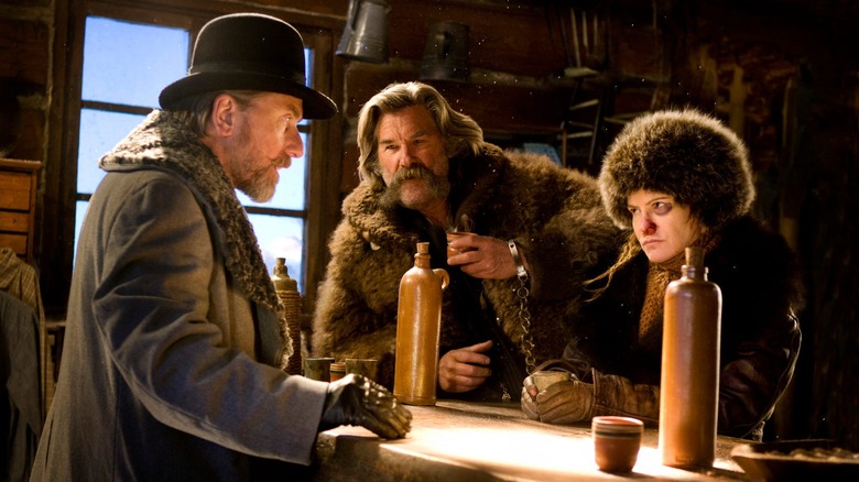 Tim Roth, Kurt Russell, and Jennifer Jason Leigh in The Hateful Eight