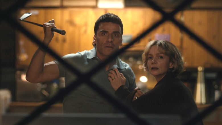 Oscar Isaac as Josh Martín and Carey Mulligan as Lindsay Crane-Martín caught in the middle of a violent argument in Beef