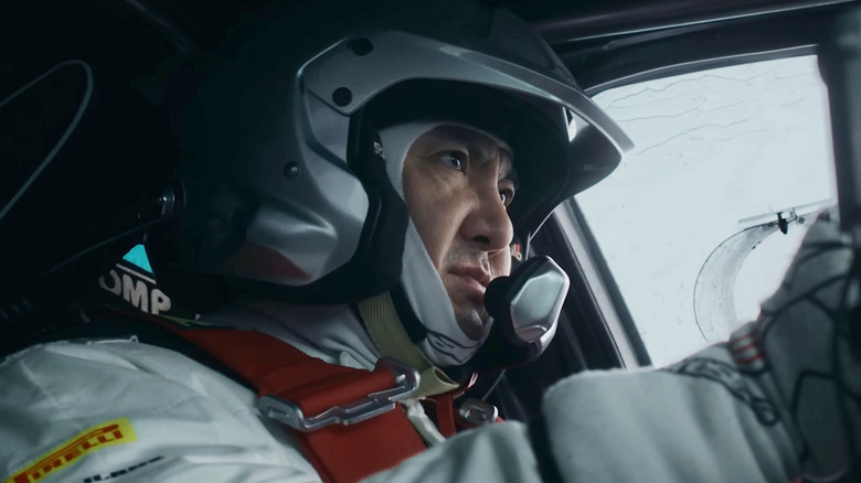 Teng Shen as Zhang Chi in the cockpit of his rally car in Pegasus 3
