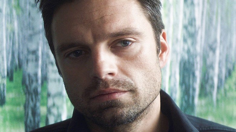 Bucky Barnes of Sebastian Stan that looks serious about Falcon and the Winter Soldier