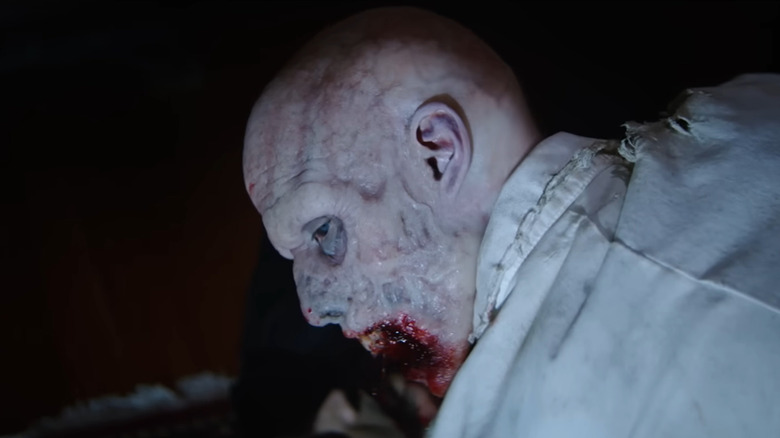 The turnaround zombie revealing itself in Resident Evil: Welcome to Raccoon City