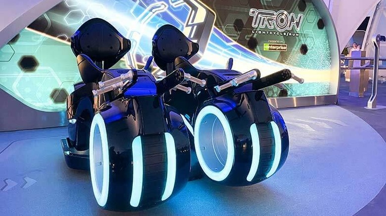 A photo of empty test seats for the TRON lightcycle ride