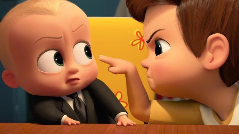 Kid points and glares at baby in "The Boss Baby"