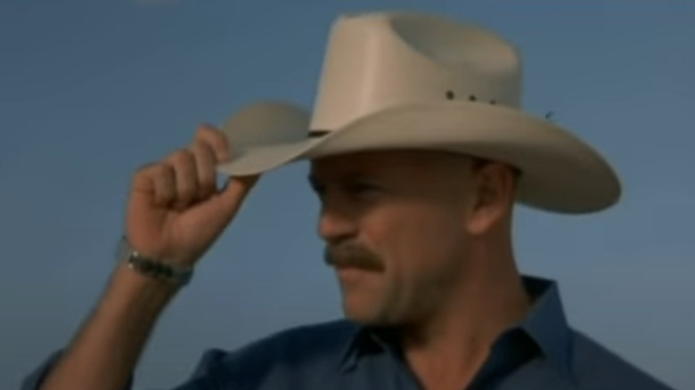 Mr. Bruce Willis Mr. Blandford tips his hat to Grand Champion