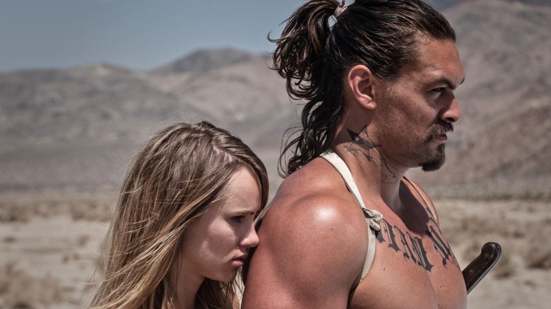 Suki Waterhouse and Jason Momoa in The Bad Batch