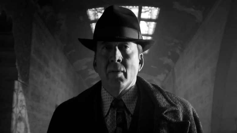 Nicolas Cage as Ben Reilly walking down a hallway in Spider-Noir Season 1