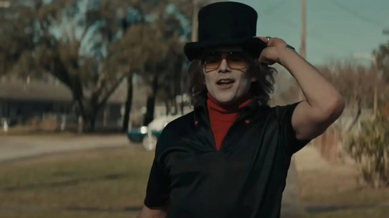 Ethan Hawke in The Black Phone wearing a top hat