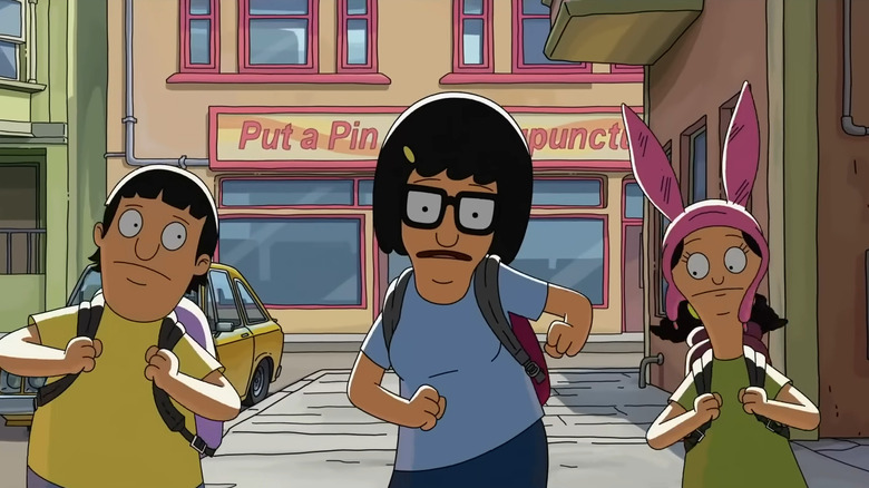 Gene, Tina, and Louise dancing together