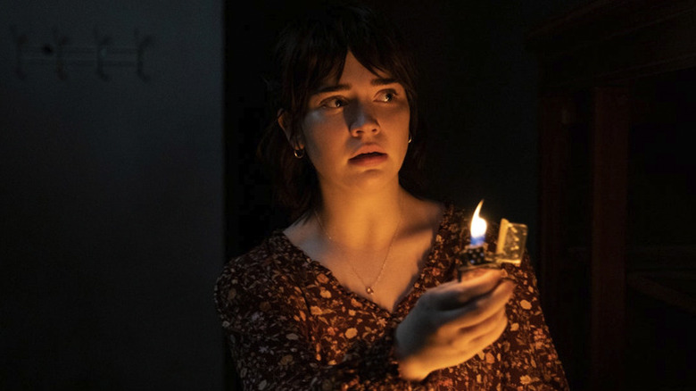 Sophie Thatcher with a lighter in The Boogeyman