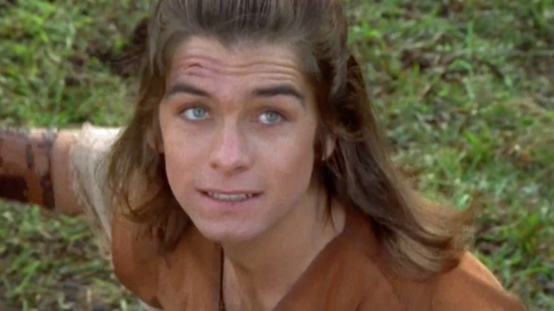 Antony Starr as David preparing to fire his slingshot in the Xena: Warrior Princess episode The Giant Killer
