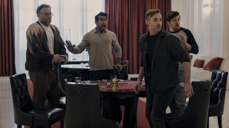 Seth Rogen, Kumail Nanjiani, Will Forte, and Christopher Mintz-Plasse as themselves standing around a table in The Boys