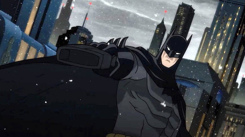 Batman holding his grapple gun in Batman: The Long Halloween