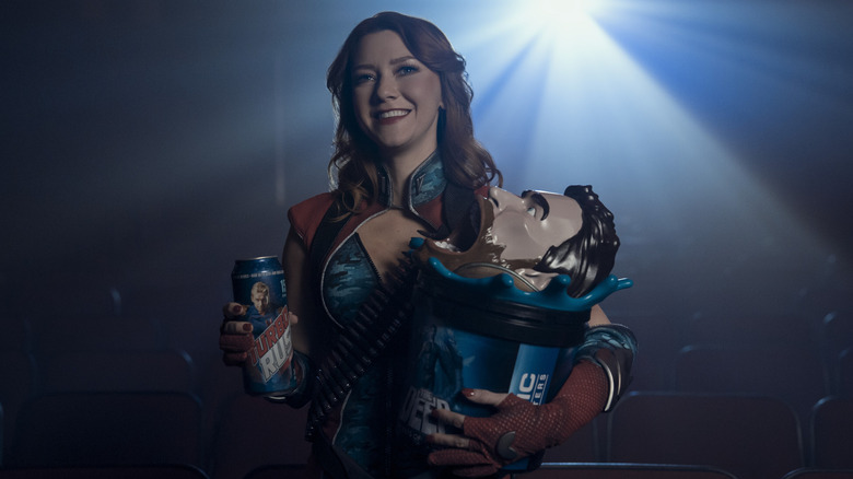 Valorie Curry as Firecracker, smiling in a movie add in The Boys.