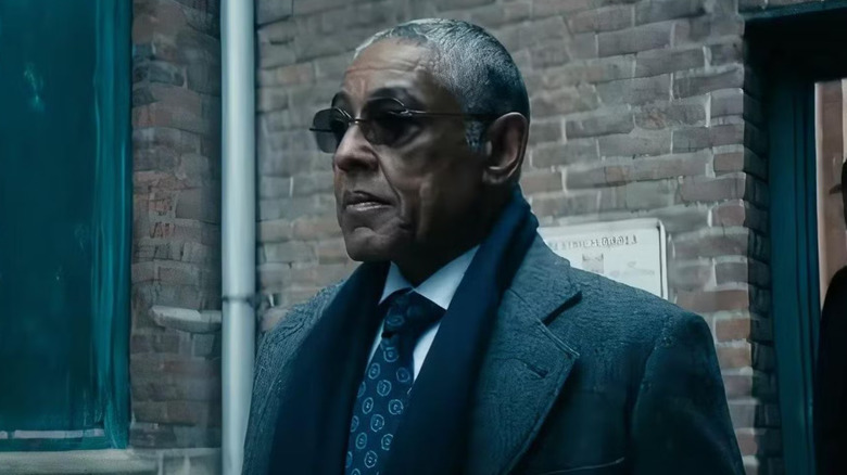 Giancarlo Esposito as Stan Edgar, walking out of a building with glasses on in The Boys.