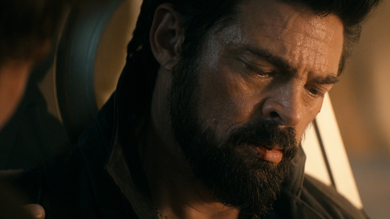 Karl Urban as William Butcher and Jack Quaid as Hugh Campbell, locking eyes during Butcher's final moments in The Boys.