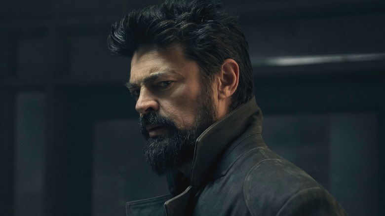 Billy Butcher (Karl Urban) standing in a dark room on "The Boys."