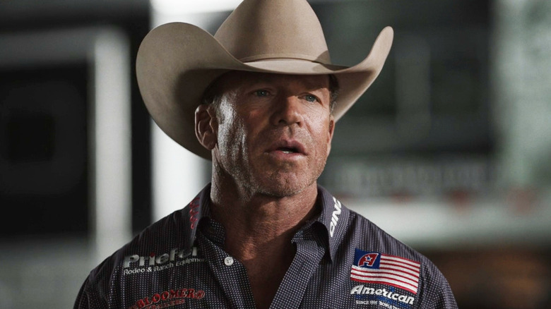 Travis Wheatley (Taylor Sheridan) standing outside on "Yellowstone."