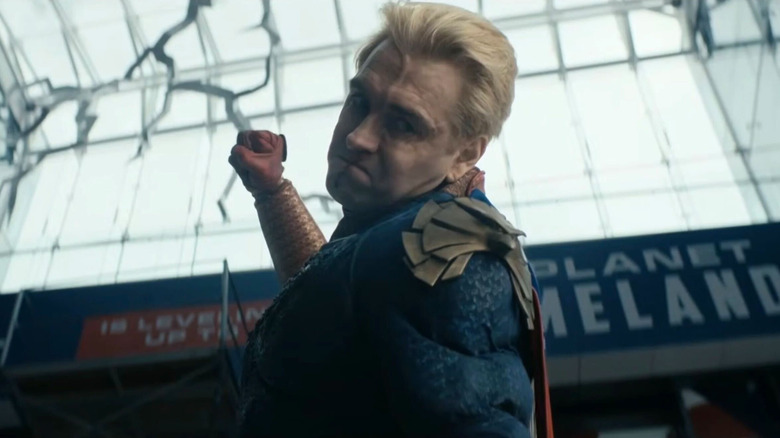 The Boys season 5 - low angle shot of Homelander raising his fist to punch someone