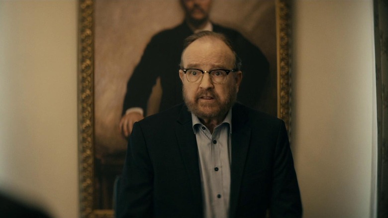 The Boys - Robert Singer behind portrait of Teddy Roosevelt