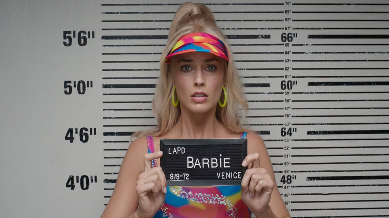 Barbie posing at the police station in Barbie