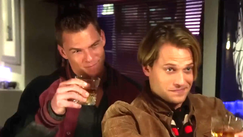 Brooklyn Nine-Nine, young Scully and Young Hitchcock enjoying a drink together, having just captured a drug kingpin