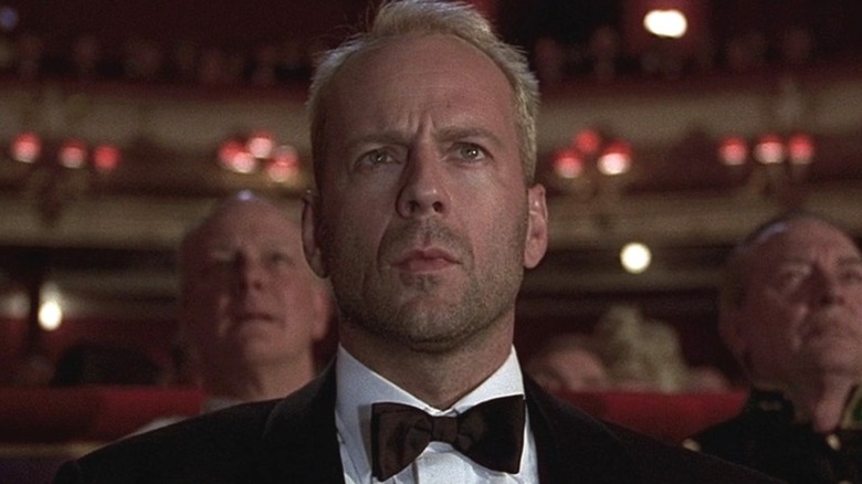 Bruce Willis' Korben Dallas wearing a bow tie in The Fifth Element
