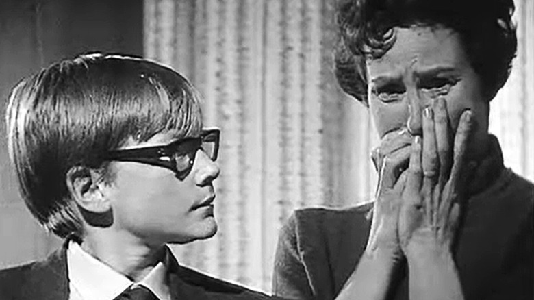 Simon looking at Ronnie's crying mother in Late Night Horror