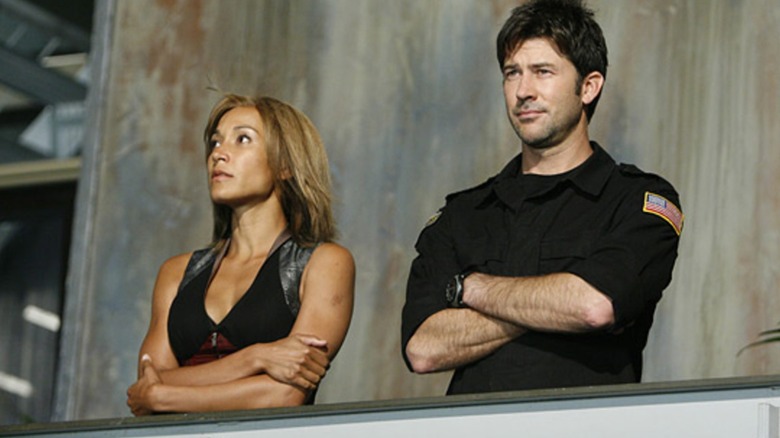 Tayla Emogan and Colonel Shaptard look at the horizon of San Francisco at StarGate Atlantis