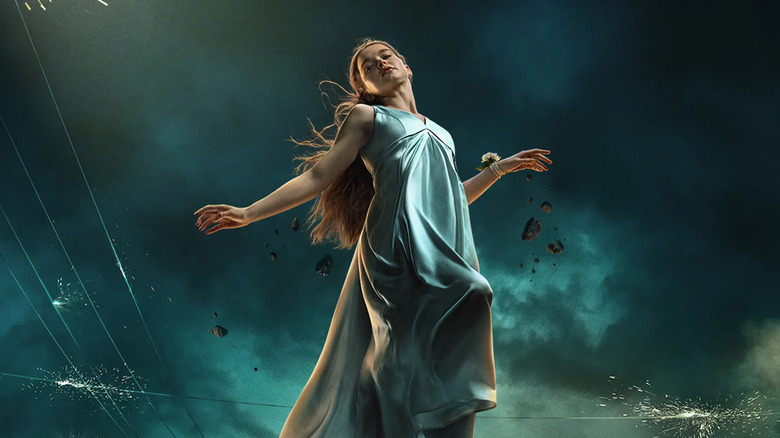 Carrie (2026) poster showing Carrie levitating in her prom dress